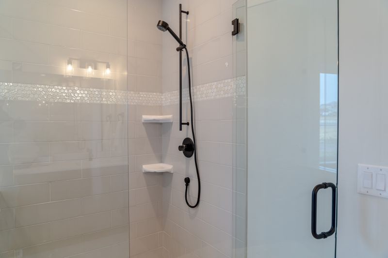 Sleek Glass Shower with Chrome Fixtures